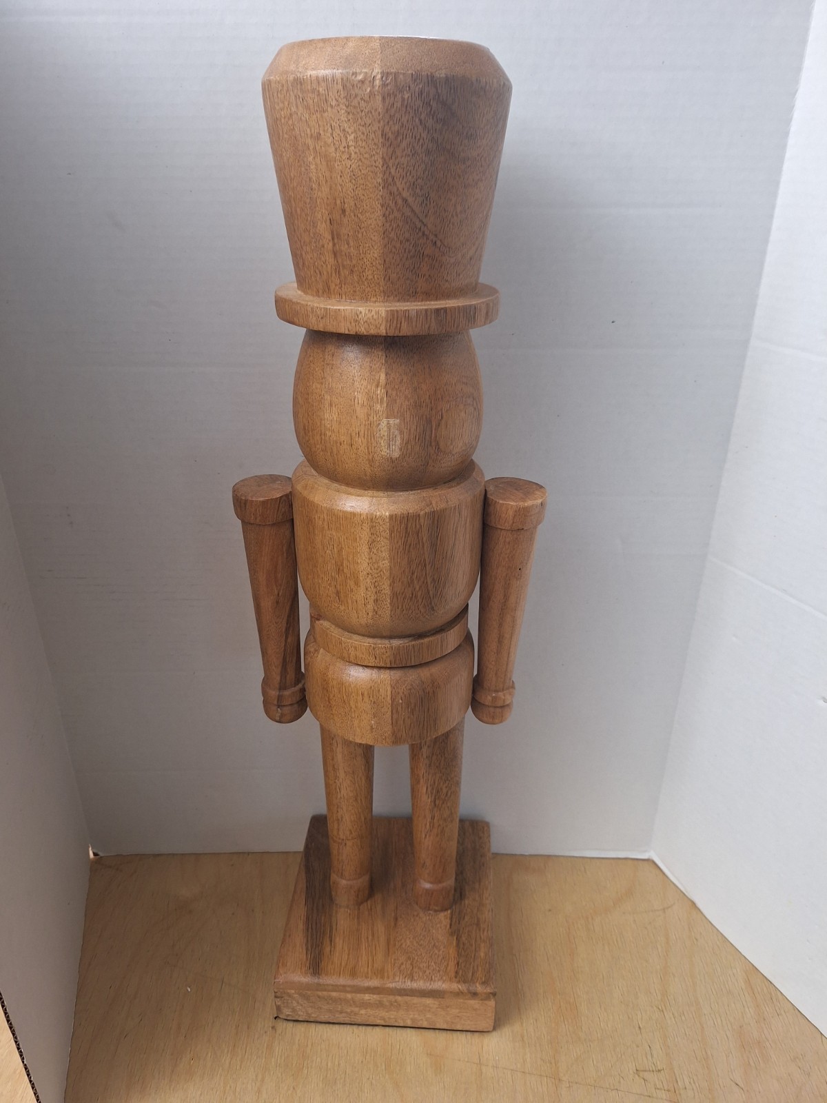 24 In natural wood nutcracker decoration.