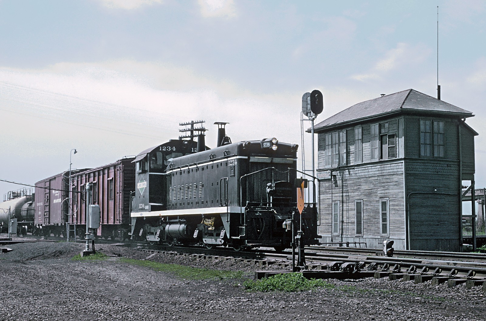Illinois Central 1234 EMD SW9 at Tuscola, IL May 1966 8.5 x 11 Photo Illinois Central 1234 EMD SW9 at Tuscola, IL May 1966 8.5 x 11 Photo