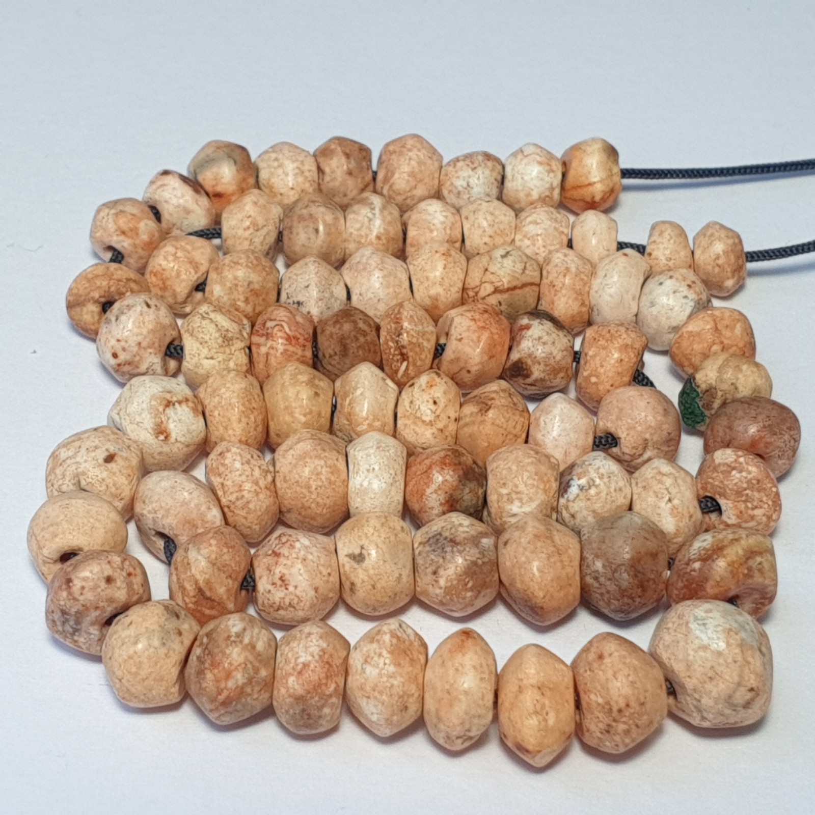 A BEAUTIFUL STRAND OF 74 ANCIENT CARNELIAN FULLY PATINIZED AGATE BEADS