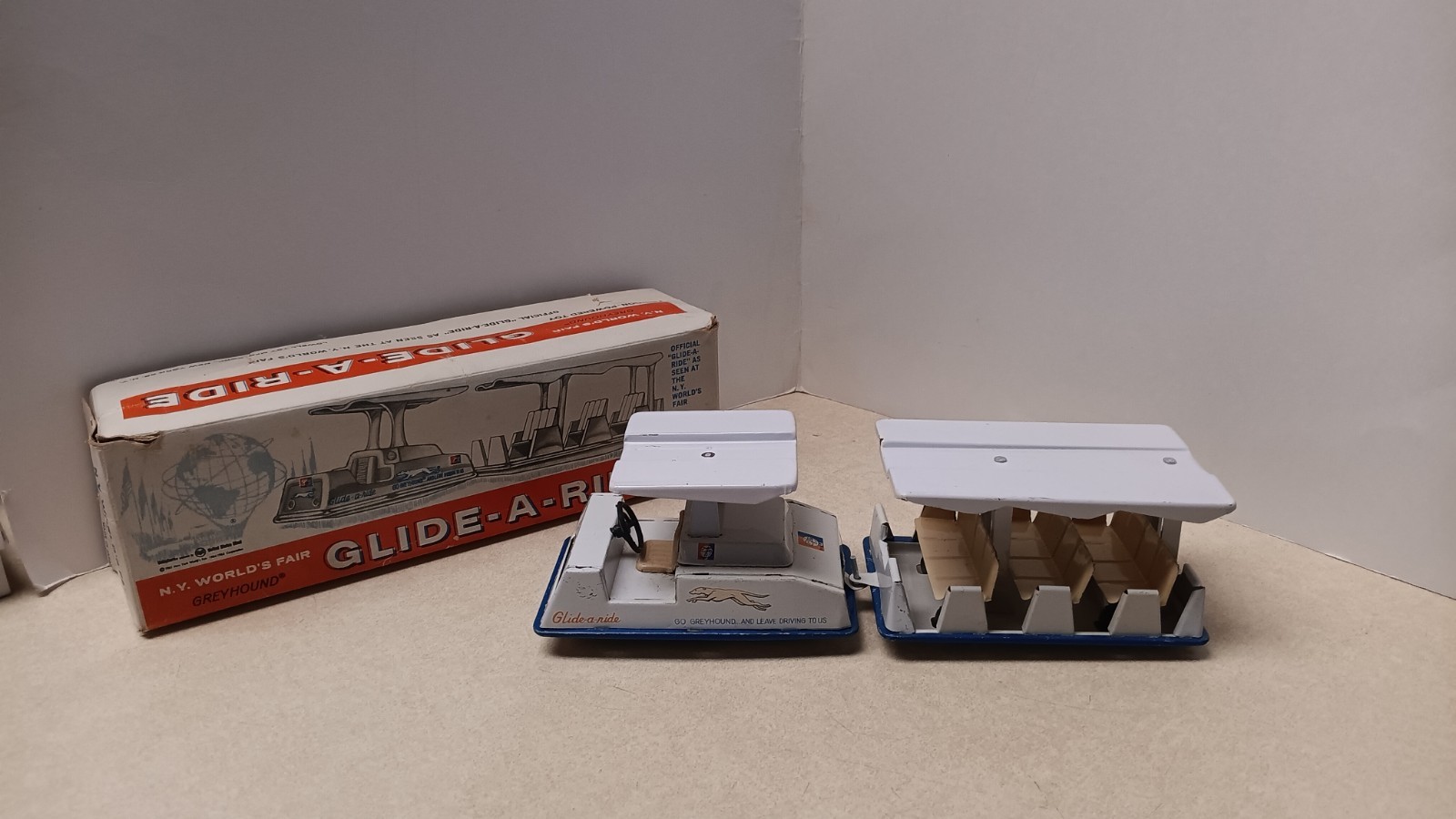 Vintage 1964 NY World's Fair Greyhound Glide-A-Ride Toy Boxed Tin Memorabilia Vintage 1964 NY World's Fair Greyhound Glide-A-Ride Toy Boxed Tin Memorabilia