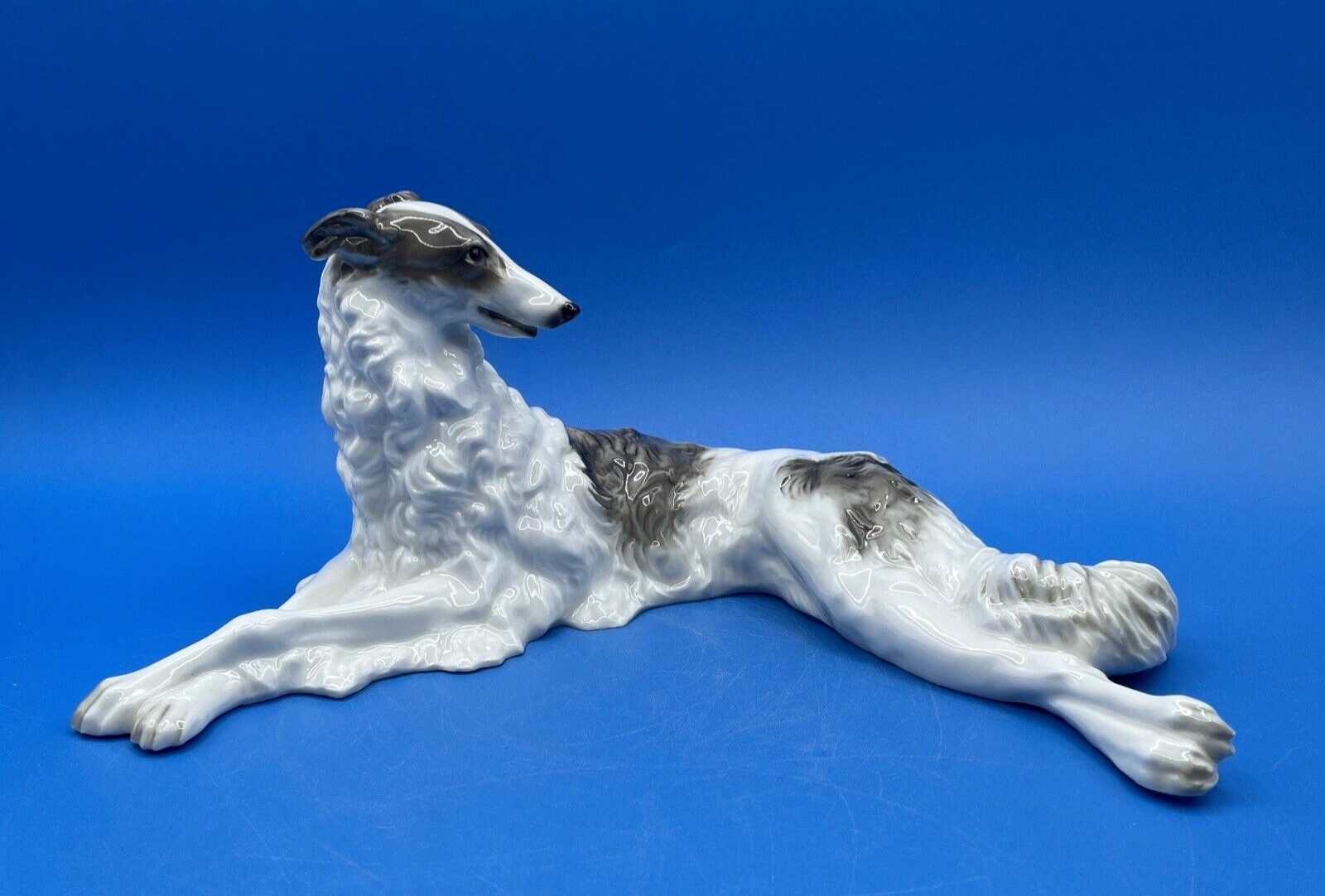 HUTSCHENREUTHER GERMANY LARGE PORCELAIN FIGURINE OF A RECLINING BORZOI DOG HUTSCHENREUTHER GERMANY LARGE PORCELAIN FIGURINE OF A RECLINING BORZOI DOG