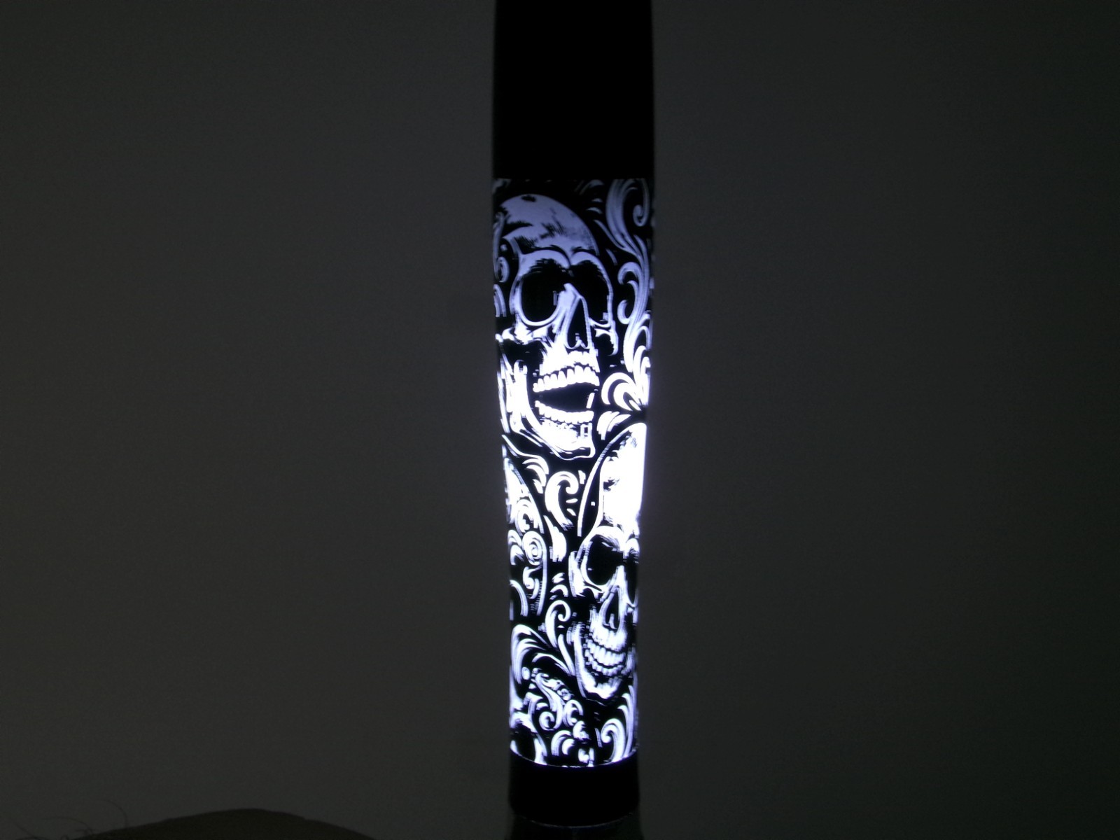 Skulls with scroll design lighted ink pen Skulls with scroll design lighted ink pen