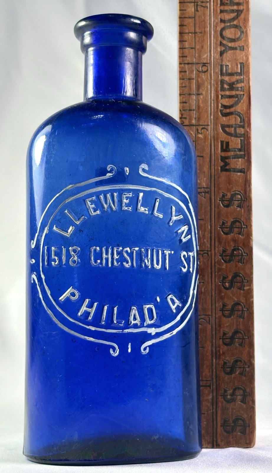 ANTIQUE COBALT BLUE PHILADELPHIA EMBOSSED DRUGSTORE MED BOTTLE LLEWELLYN 1880S