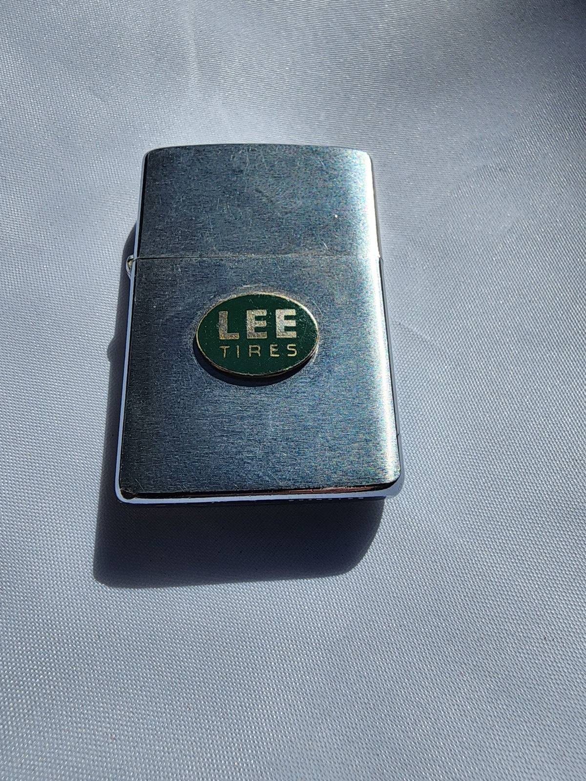 Vintage 1950\'s Zippo Advertising Lighter – Lee Tires - upraised medal