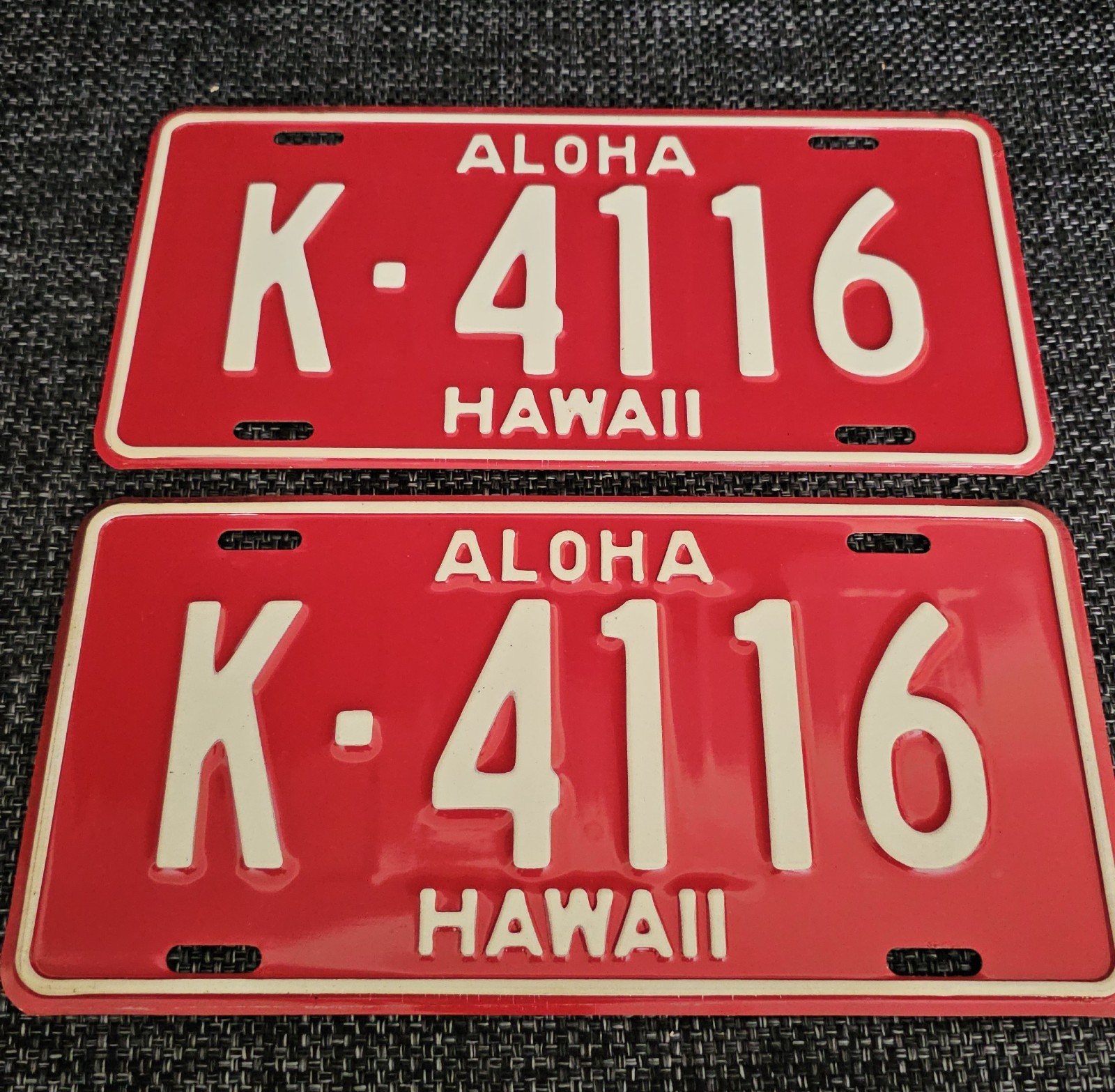 1957-60 NOS RED HAWAII LICENSE PLATES PAIR # \'K-4116\' ANTIQUE, NEVER INSTALLED 1957-60 NOS RED HAWAII LICENSE PLATES PAIR # \'K-4116\' ANTIQUE, NEVER INSTALLED
