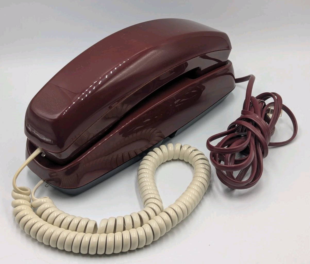 Vintage GVC Corp. Trimline BURGUNDY Push Button Landline Telephone W/ White Cord Vintage GVC Corp. Trimline BURGUNDY Push Button Landline Telephone W/ White Cord