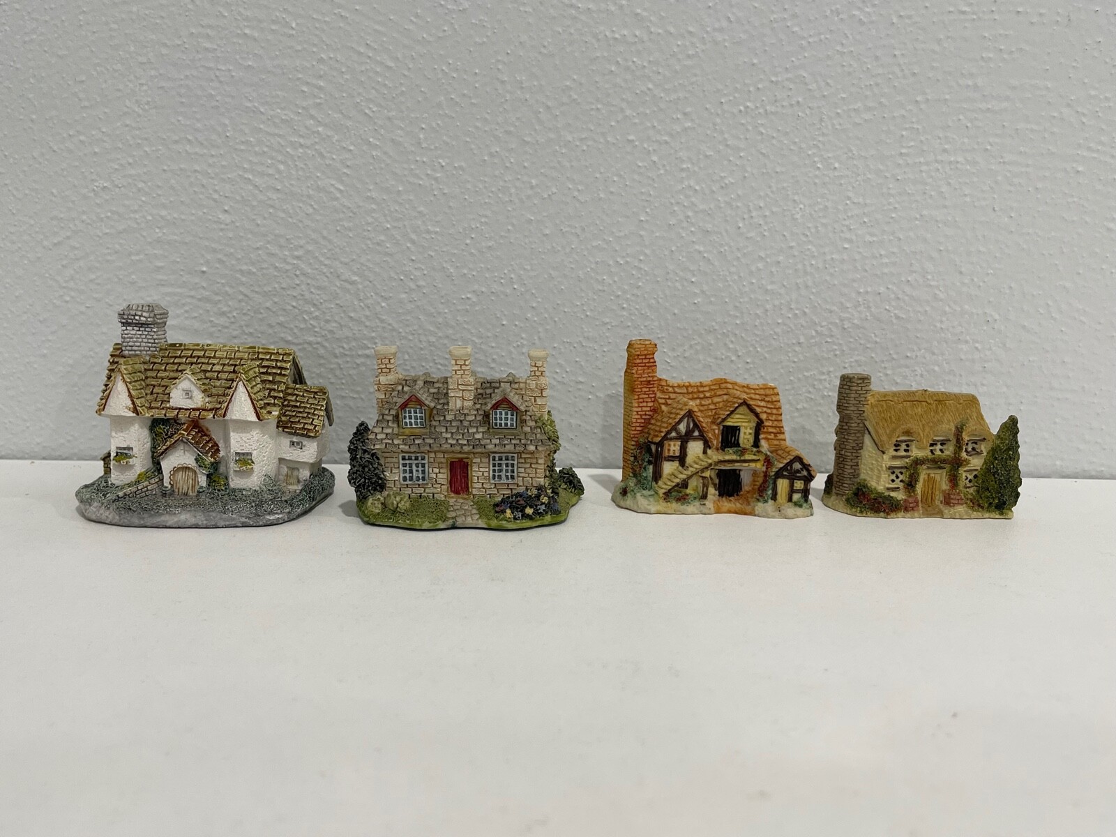 Lot of 4 Cottage Figurines Including Tudor Hall Lot of 4 Cottage Figurines Including Tudor Hall