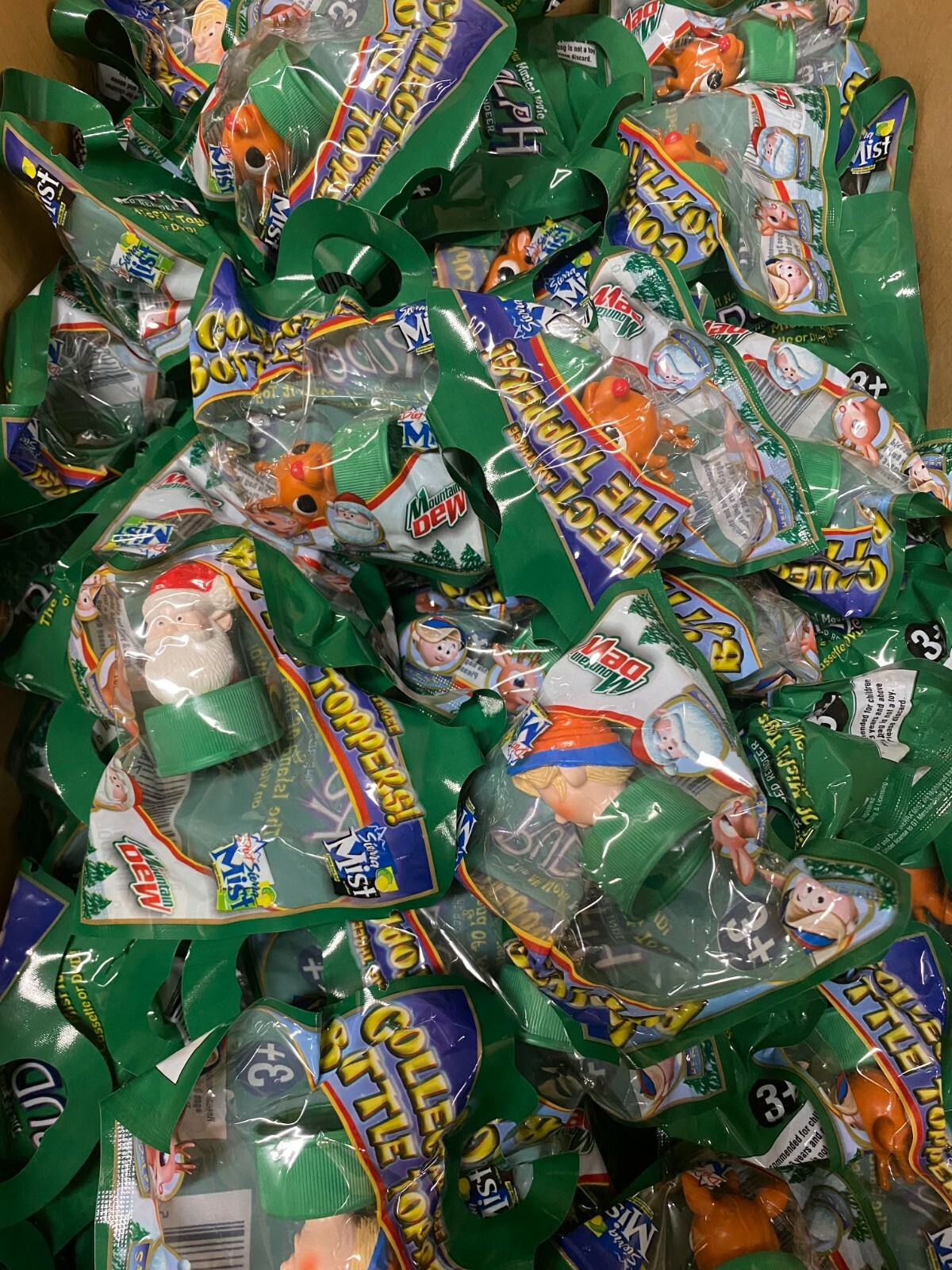99 Pieces Rudolph the Red Nosed Reindeer Bottle Toppers Mountain Dew Premium 99 Pieces Rudolph the Red Nosed Reindeer Bottle Toppers Mountain Dew Premium