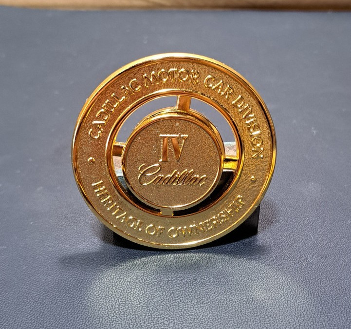 Cadillac Motor Car Division Heritage of Ownership IV Gold Tone Emblem Medallion
