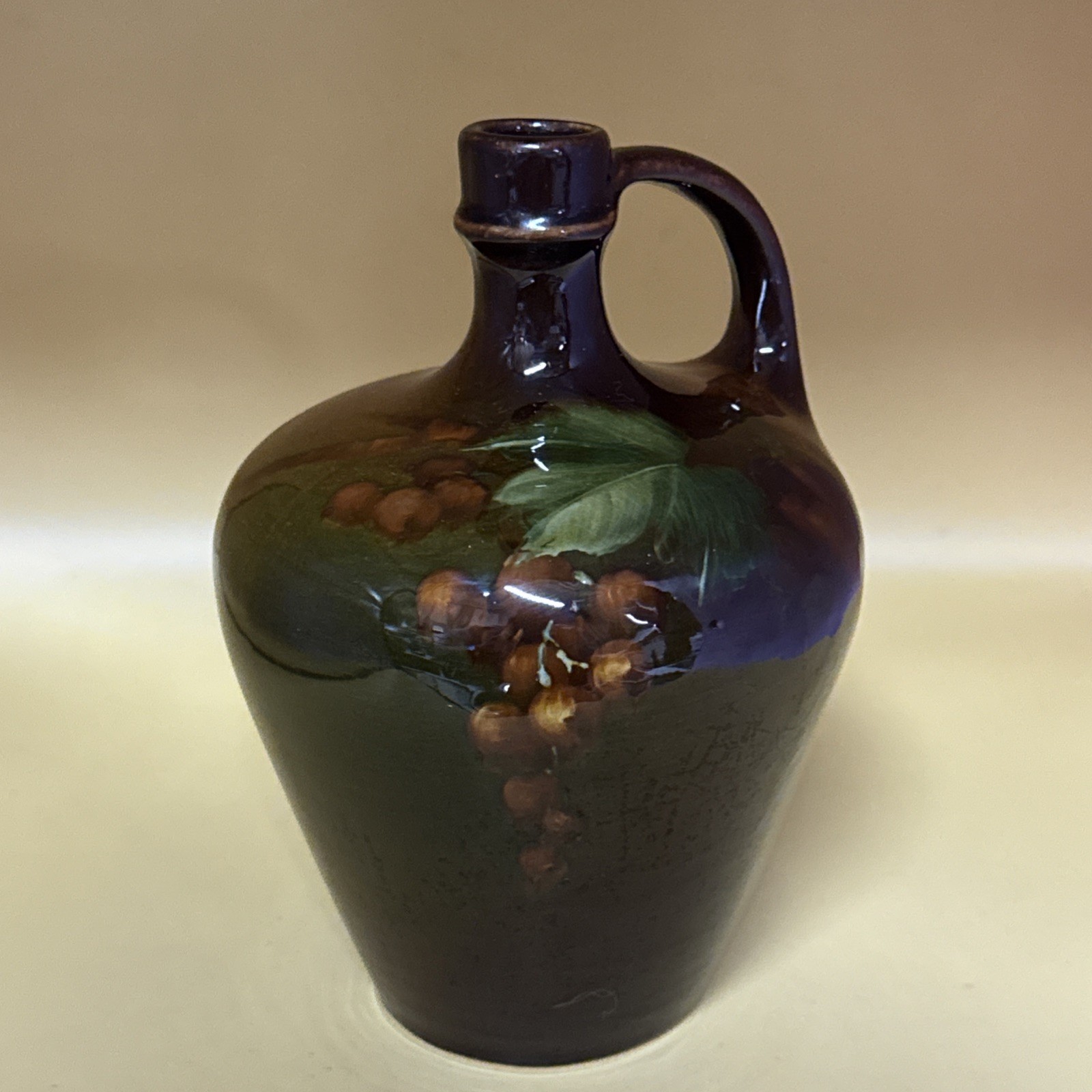 Rozane Ware Brown Jug Back stamped And Has A Grape leaf Grapes Design Rozane Ware Brown Jug Back stamped And Has A Grape leaf Grapes Design