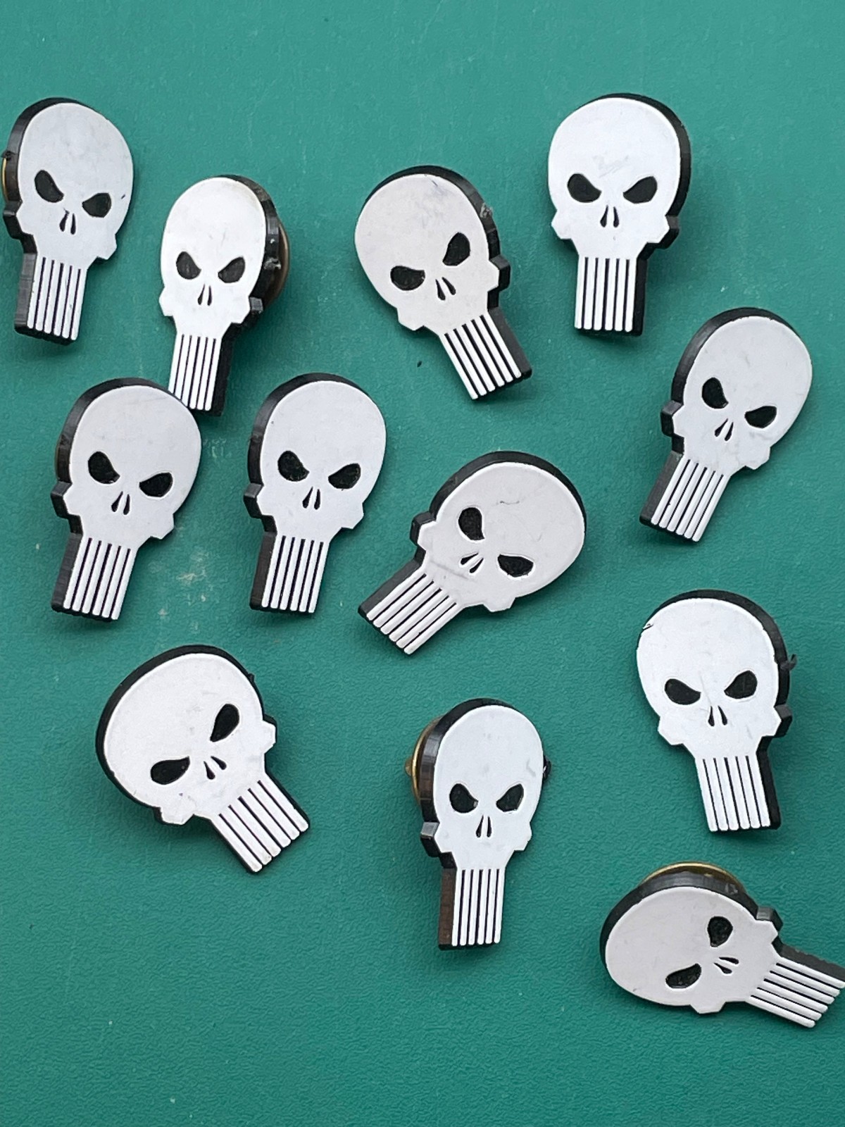 One Dozen (12) Promotional Marvel Comics Punisher Skull Pins