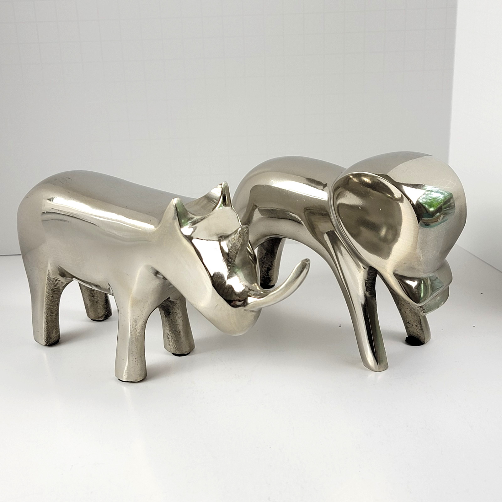 MCM Vintage Modernist Silver Metal Elephant Rhino Figurines Feng Shui Pair MCM Vintage Modernist Silver Metal Elephant Rhino Figurines Feng Shui Pair