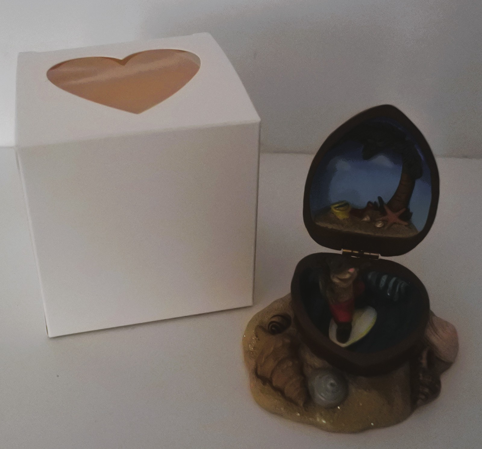 Maruri In a Nut Shell SURFING THE INNERNUT figurine by Jill Trenholm RARE Maruri In a Nut Shell SURFING THE INNERNUT figurine by Jill Trenholm RARE