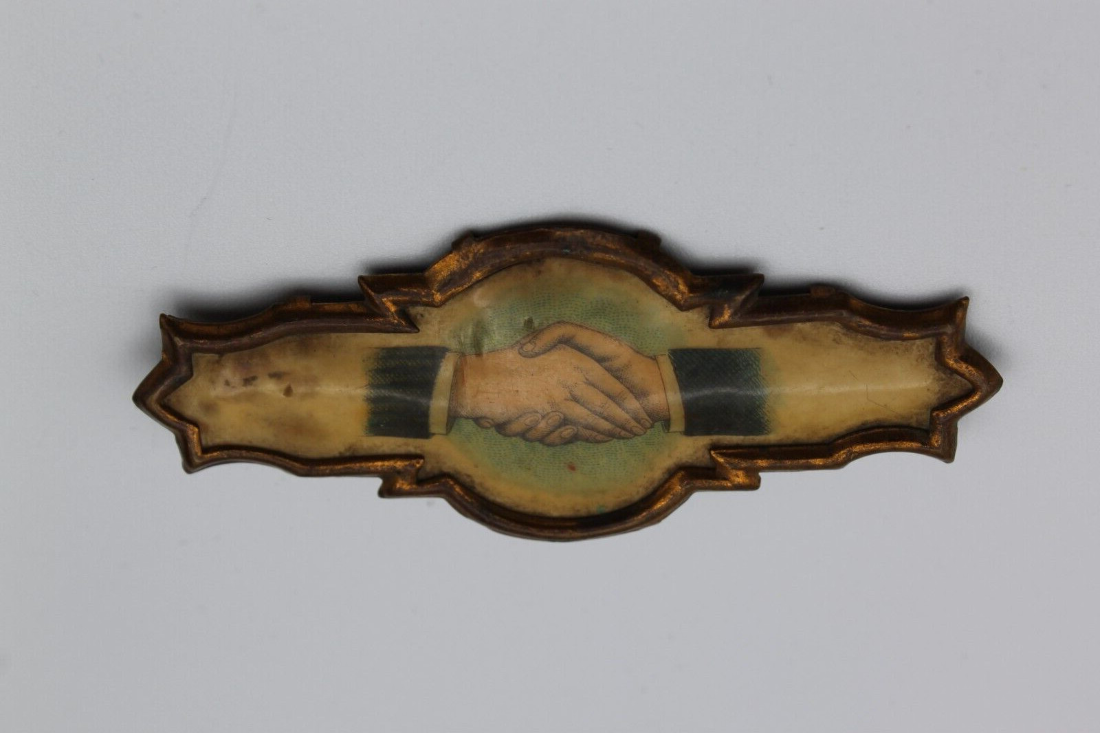 Antique WHITEHEAD & HOAG CO Oddfellows Handshake Masons Celluloid Pin