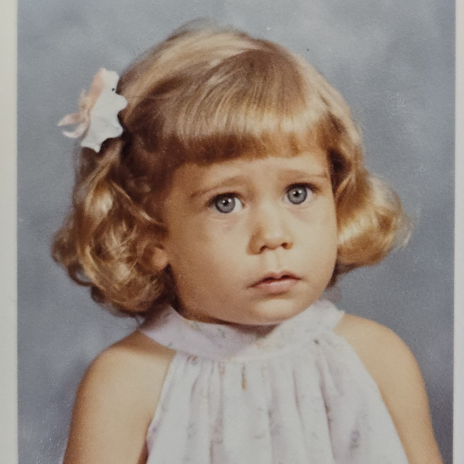 Small Color Photograph of Sad Looking Young Girl | Big Blue Eyes Blonde Hair Small Color Photograph of Sad Looking Young Girl | Big Blue Eyes Blonde Hair