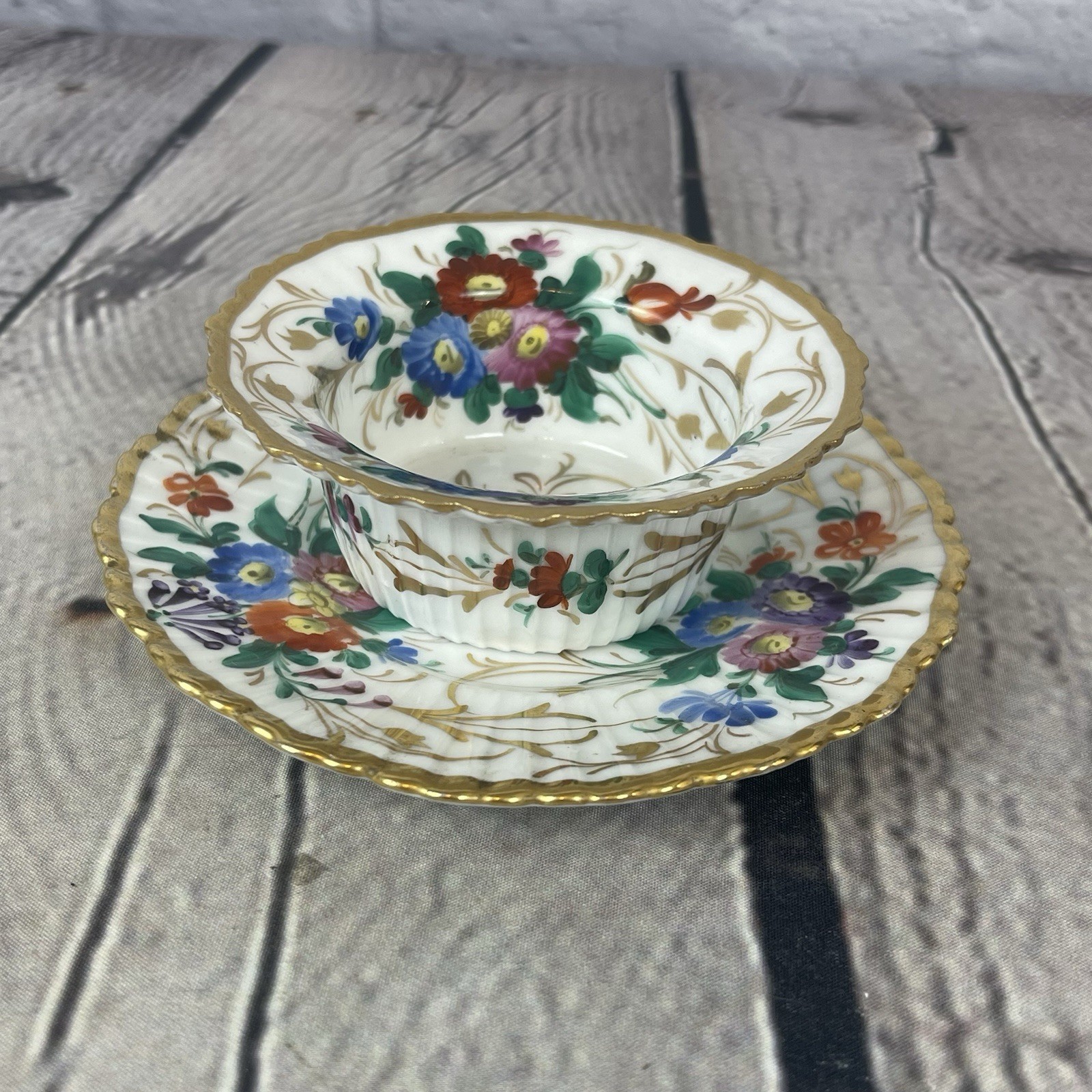 Antique Austrian Porcelain Teacup and Saucer Hand Painted Floral Gold R Briggs