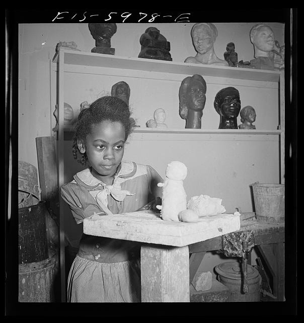 Photo:1942 Girl Modeling Clay in Classroom Teacher Art Lesson