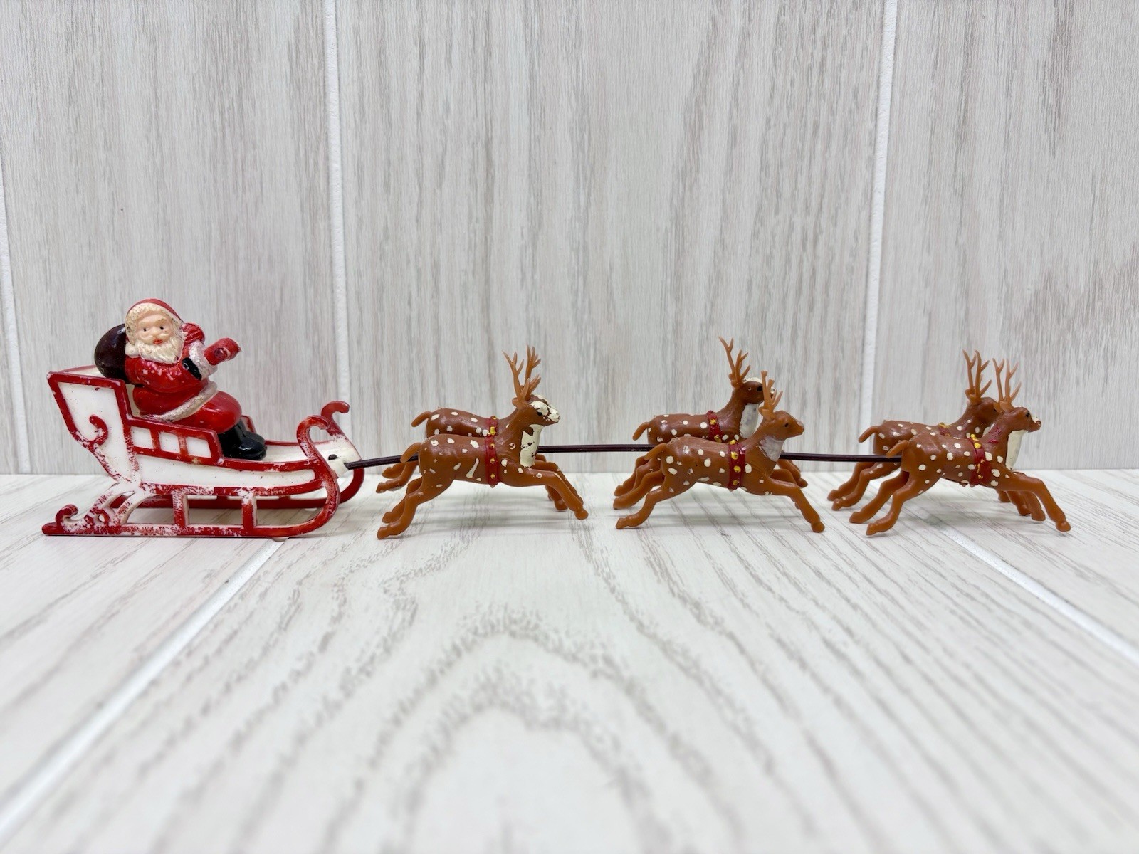 Vintage Santa in Sleigh with 6 Reindeer Plastic Tabletop Decor Hong Kong Vintage Santa in Sleigh with 6 Reindeer Plastic Tabletop Decor Hong Kong