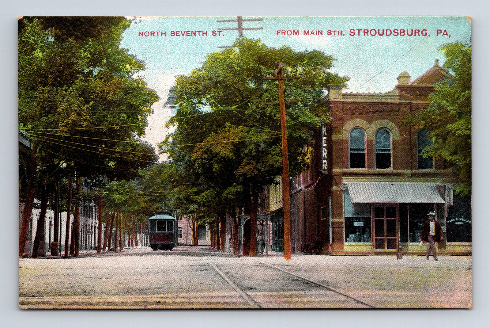 Stroudsburg PA North 7th Street & Main Trolley Car Cigar Store Man Postcard Stroudsburg PA North 7th Street & Main Trolley Car Cigar Store Man Postcard