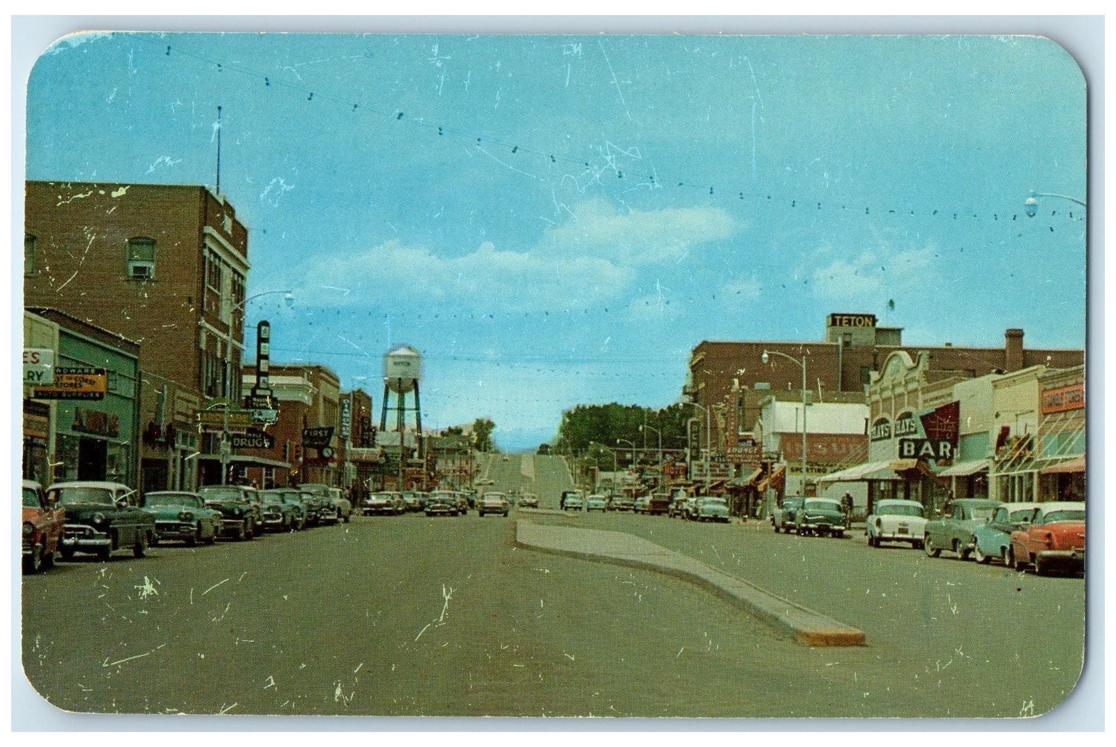 c1960s Business District Looking West Riverton Wyoming WY Unposted Cars Postcard c1960s Business District Looking West Riverton Wyoming WY Unposted Cars Postcard