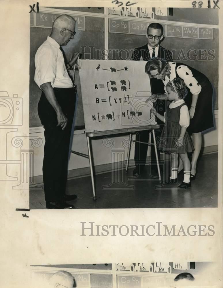 1964 Press Photo St. Paul First English Lutheran educators with student Paretti. 1964 Press Photo St. Paul First English Lutheran educators with student Paretti.