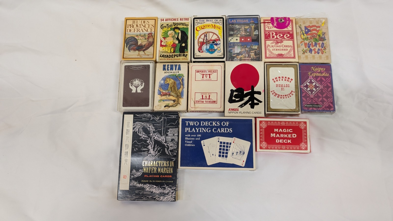 Diverse collection of 16 vintage regional and specialty playing card decks Diverse collection of 16 vintage regional and specialty playing card decks