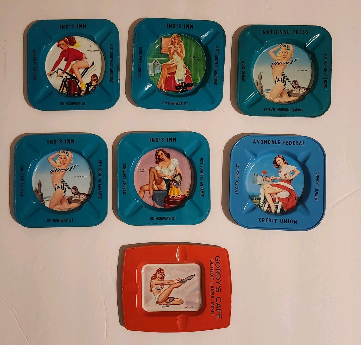 Vintage Pinup Glamour Girl Tin Advertising Ashtray Lot of 7 Vintage Pinup Glamour Girl Tin Advertising Ashtray Lot of 7
