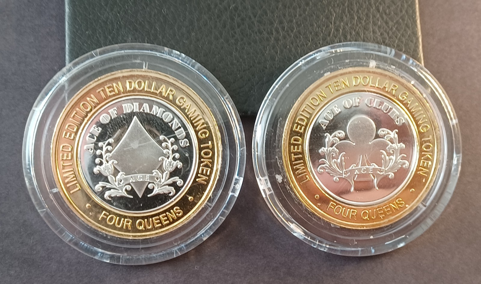 Silver Strike Four Queens Casino $10 gaming tokens (2), Ace of Diamonds & Clubs Silver Strike Four Queens Casino $10 gaming tokens (2), Ace of Diamonds & Clubs