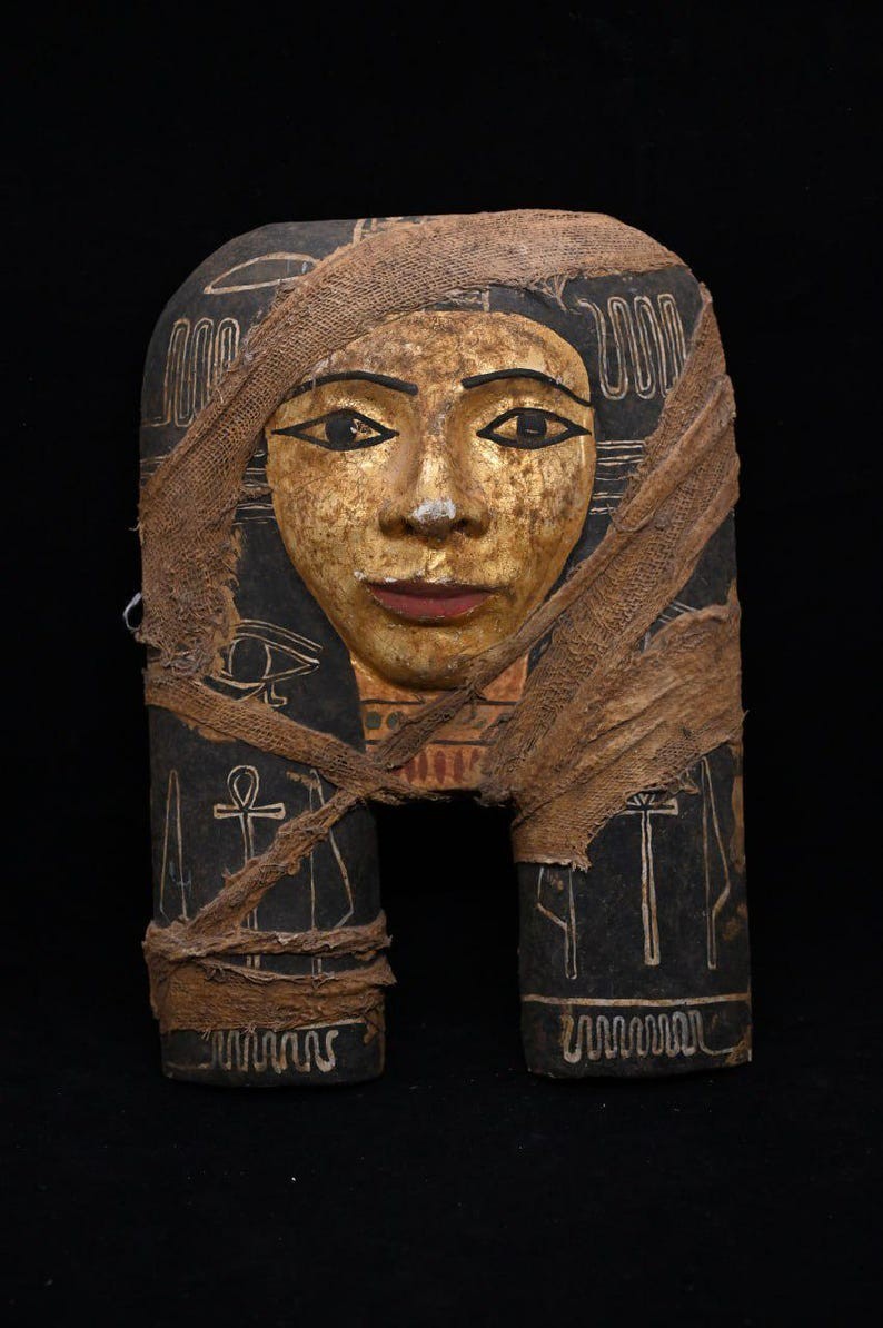 Hathor statue golden cow goddess of love and music, Egyptian artifact