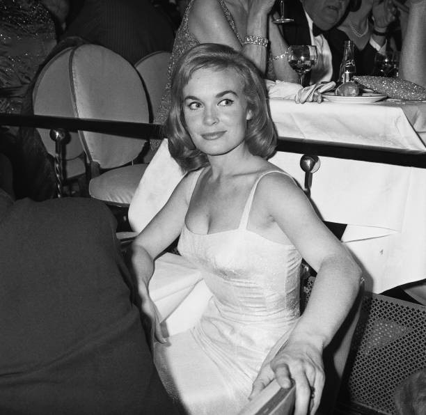 British actress Shirley Eaton wearing a white dress with a square - Old Photo