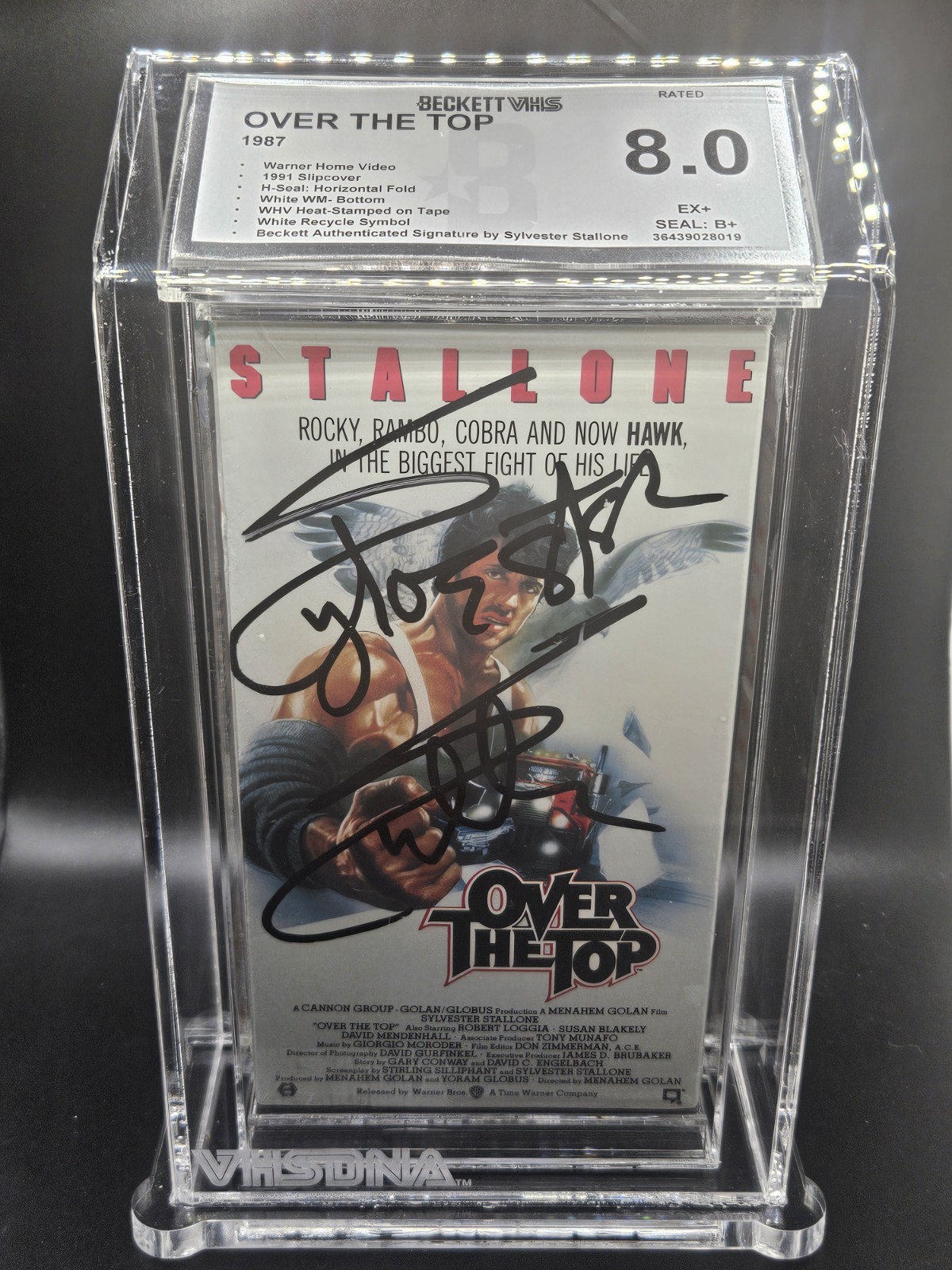 Sylvester Stallone Rare Full Name Auto 1987 Over The Top VHS Beckett 8.0 Seal B+ Sylvester Stallone Rare Full Name Auto 1987 Over The Top VHS Beckett 8.0 Seal B+