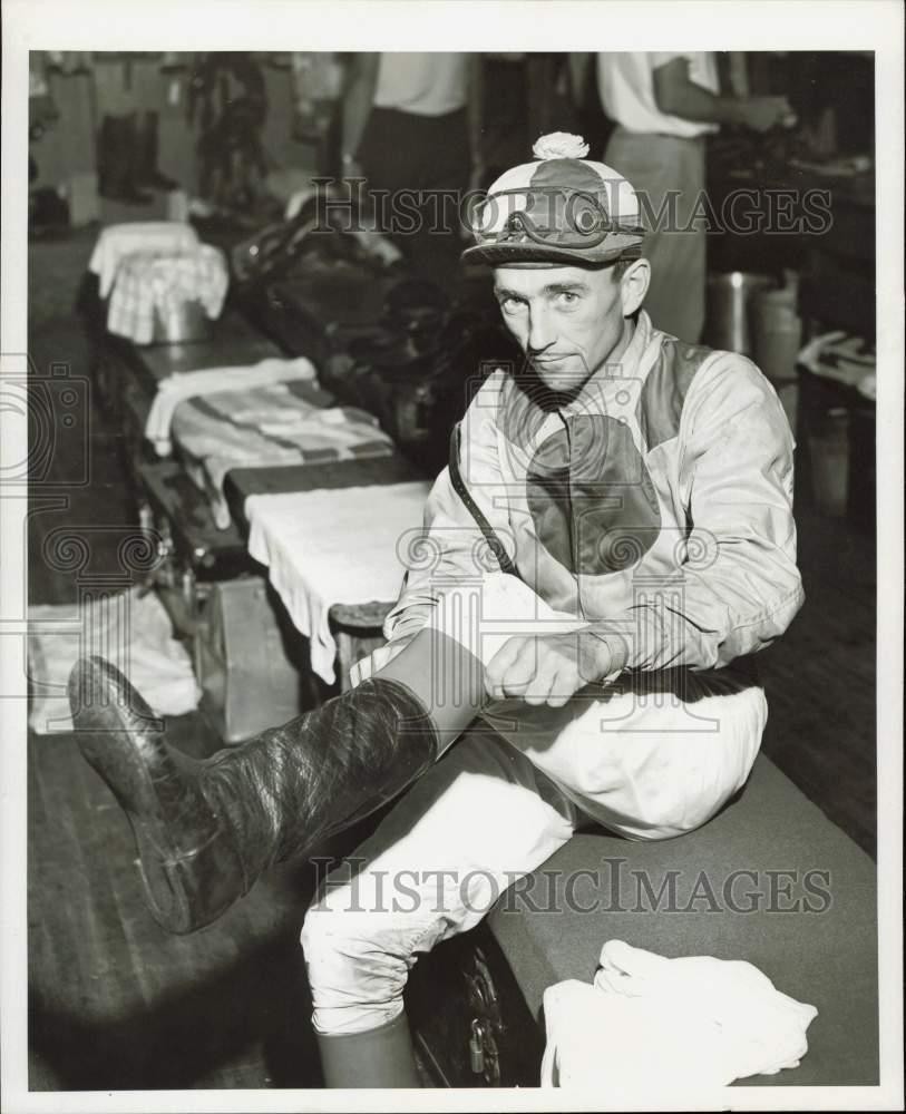 1957 Press Photo Jockey Dave Erb gets ready for a horse race - lra36153 1957 Press Photo Jockey Dave Erb gets ready for a horse race - lra36153