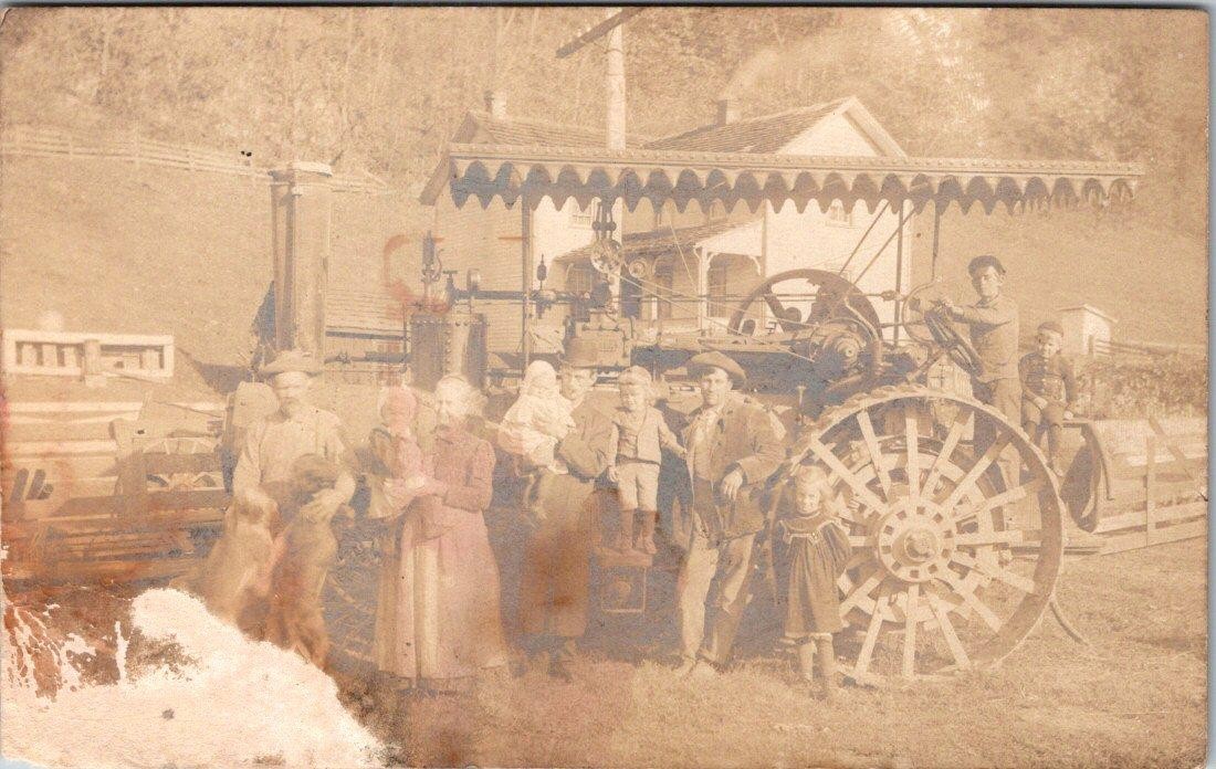 1907-10s RPPC STEAM ENGINE TRACTOR FAMILY FARMHOUSE OUTHOUSE REAL PHOTO POSTCARD