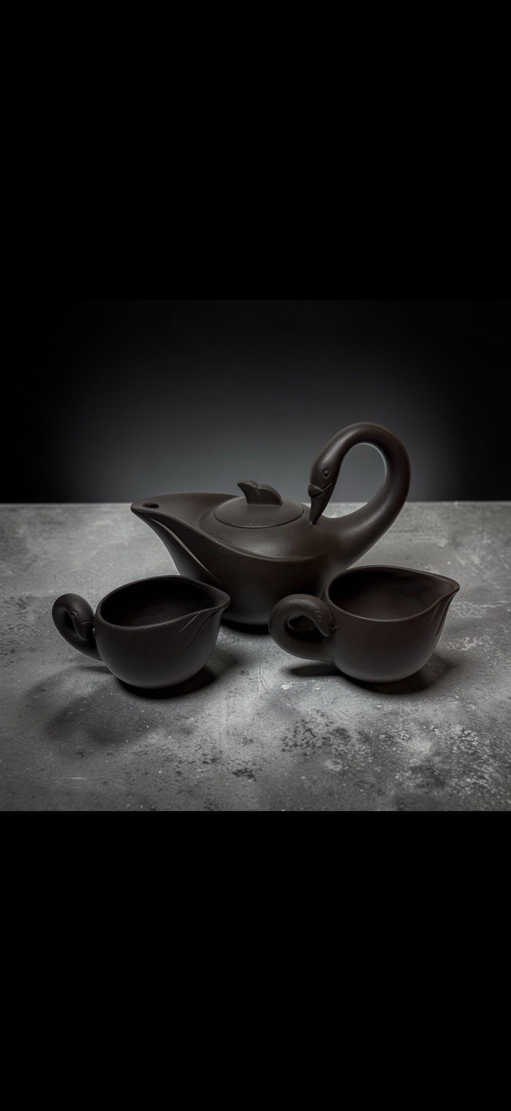 Yixing Zisha clay teapot and creamer set with swan-shaped handles Yixing Zisha clay teapot and creamer set with swan-shaped handles