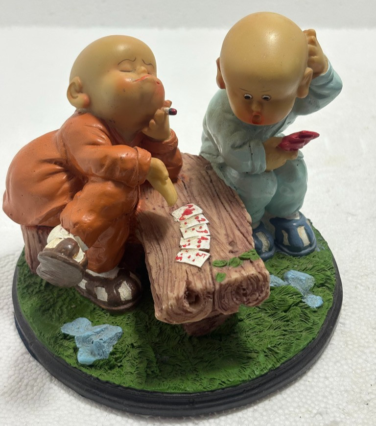 baby monk resin figurine playing card poker hand baby monk resin figurine playing card poker hand