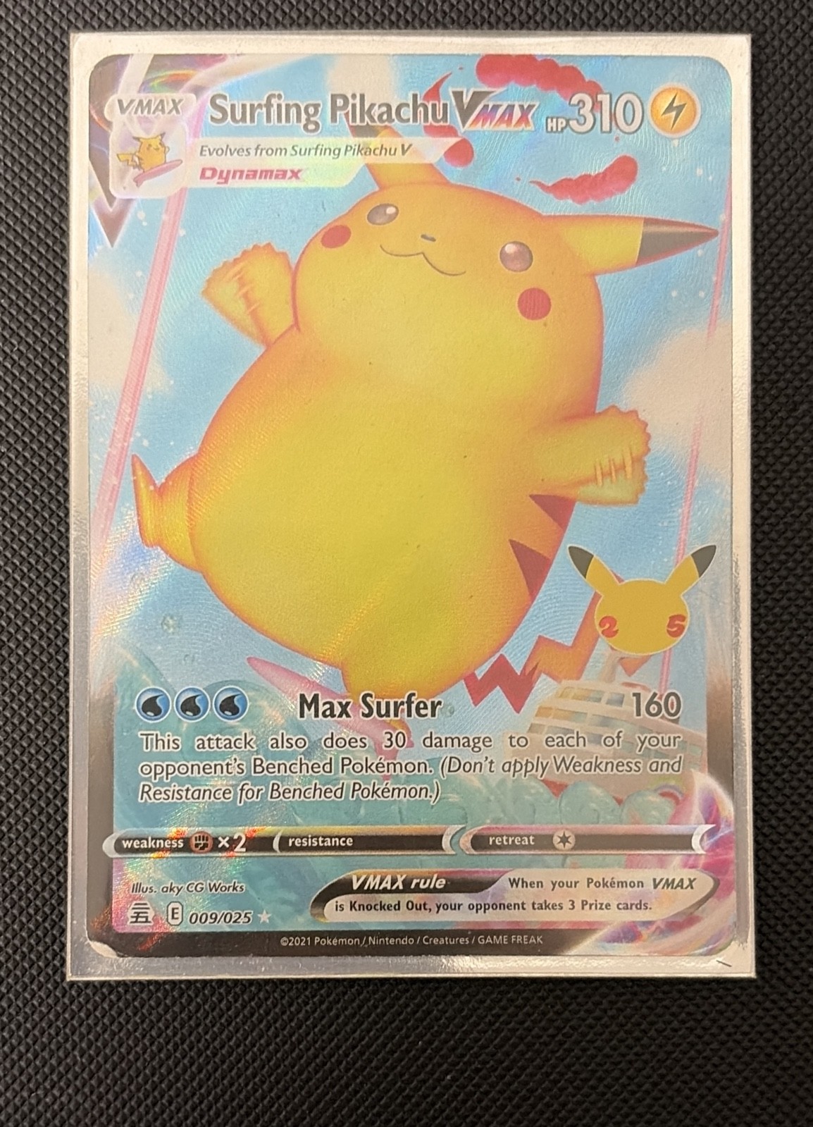Surfing Pikachu VMAX 009/025 Celebrations Holo Surfing Pikachu VMAX 009/025 Celebrations Holo