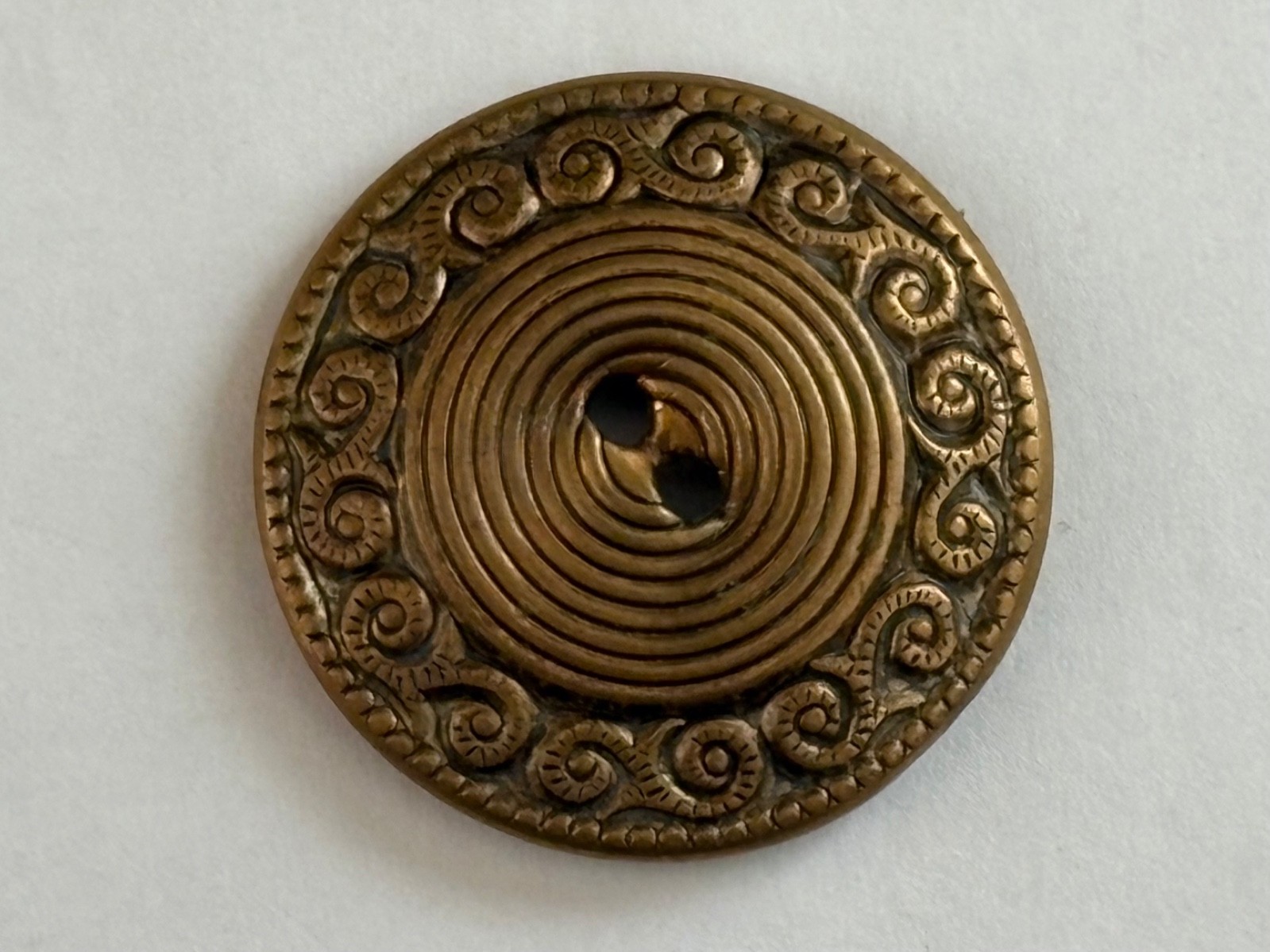One Vintage Goldtone Metal Swirl Geometric Sewing Button Hollow Round 1 1/8”