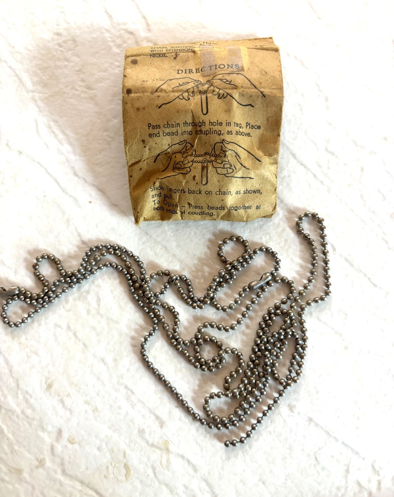 WW11 nickel dog tag chain with original envelope NS Meyer, Inc. N.Y, WW11 nickel dog tag chain with original envelope NS Meyer, Inc. N.Y,