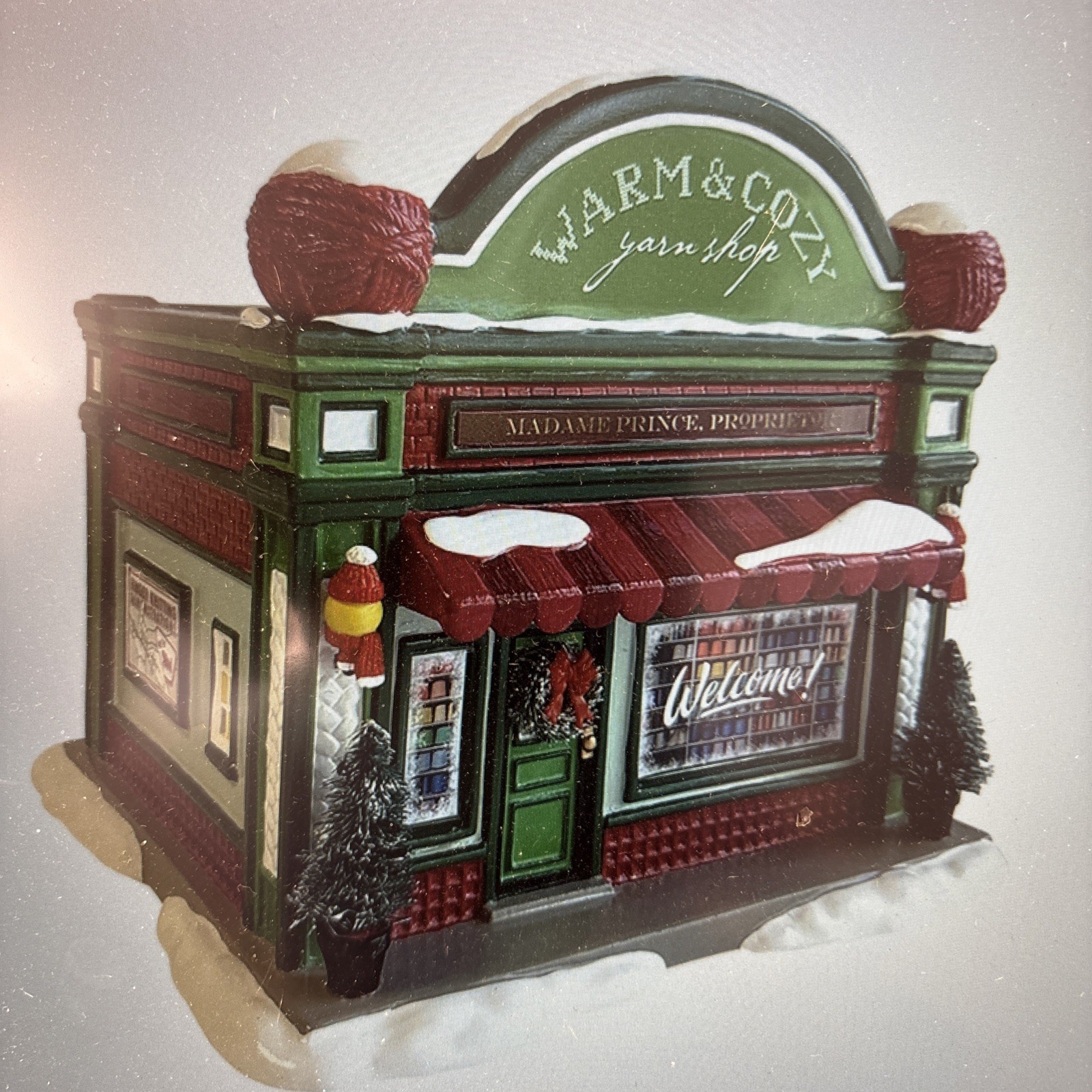 Department 56 6013586 Warm & Cozy Yarn Shop - Snow Village