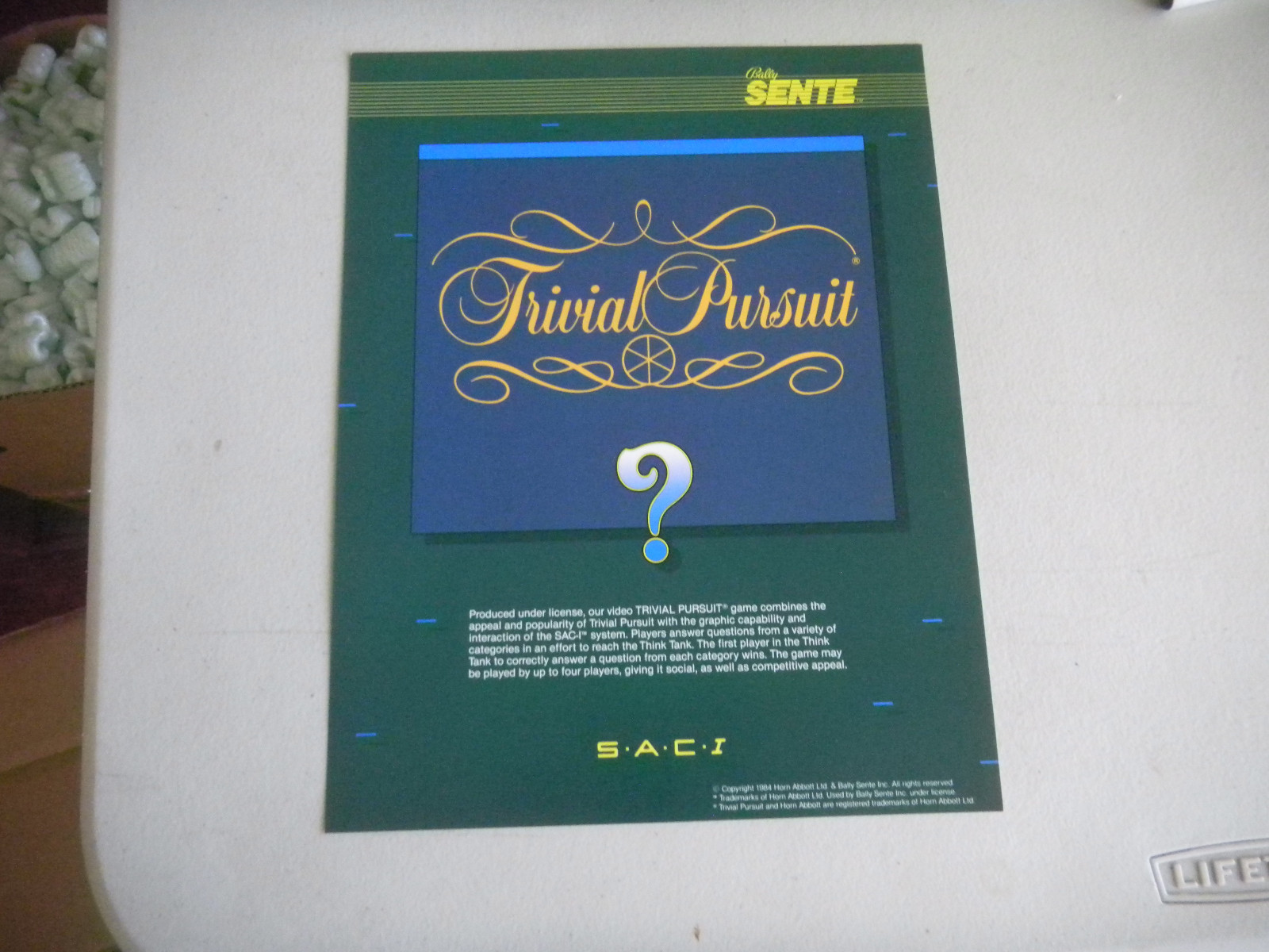 NOS ORIGINAL 1985 BALLY SAC SENTE TRIVIAL PURSUIT ARCADE VIDEO GAME FLYER NOS ORIGINAL 1985 BALLY SAC SENTE TRIVIAL PURSUIT ARCADE VIDEO GAME FLYER