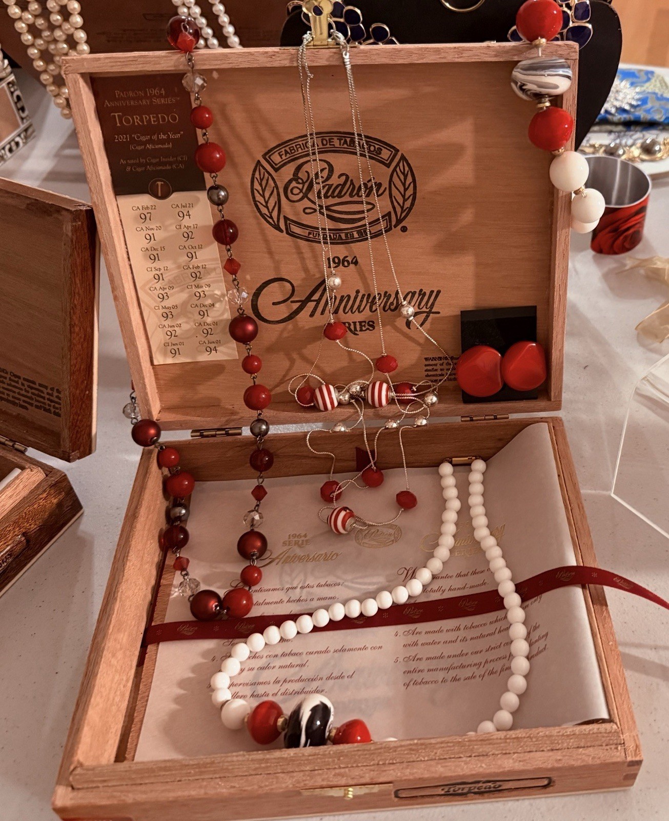 Bracelet, Earrings and 3 Necklaces in a Elegant Padron 1964 Cigar Box Bracelet, Earrings and 3 Necklaces in a Elegant Padron 1964 Cigar Box