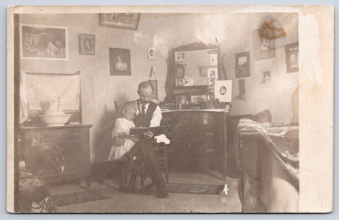 Antique Interior Scene Man Holding Child Reading Book 1905 RPPC Antique Interior Scene Man Holding Child Reading Book 1905 RPPC