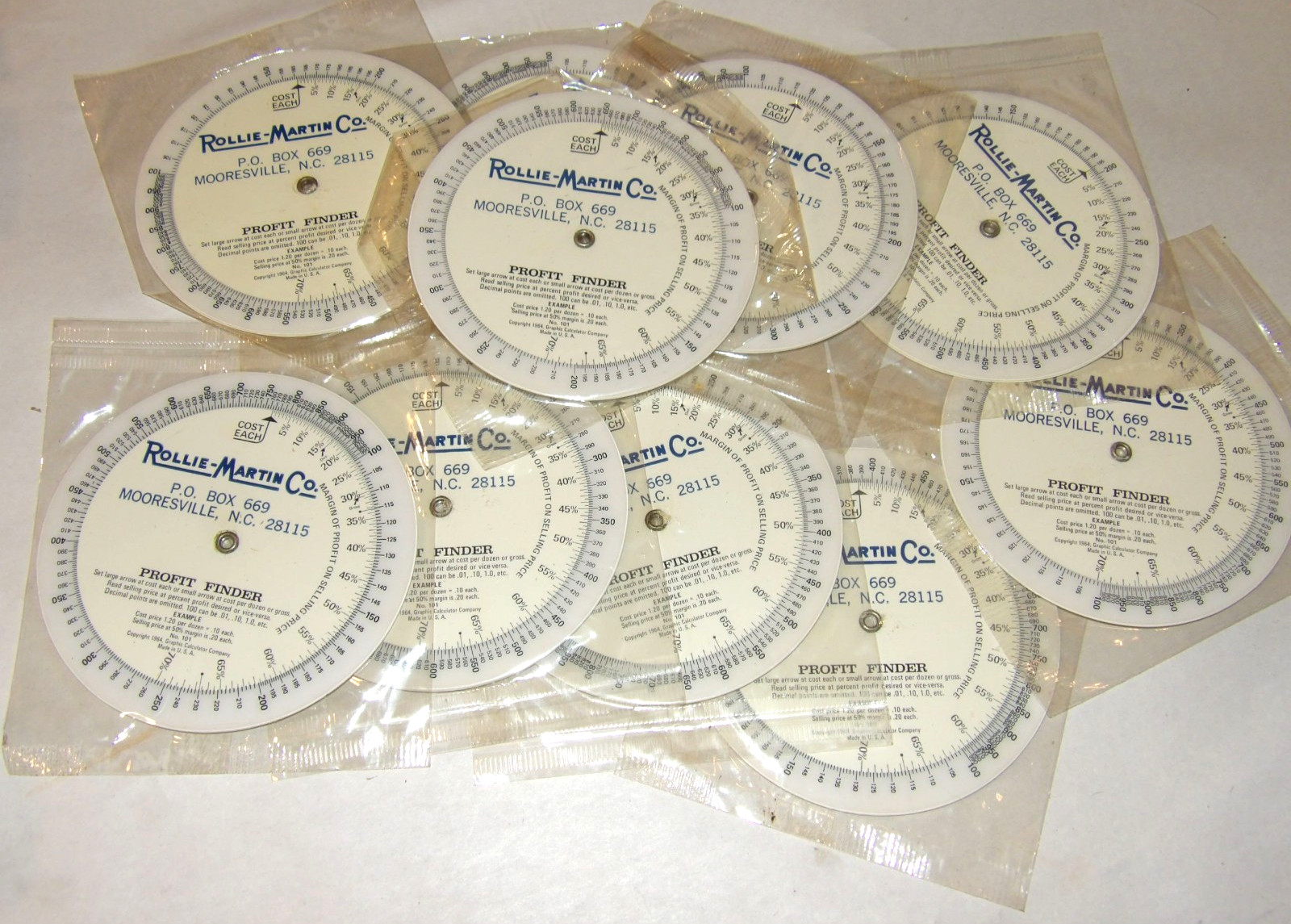 10 UNUSED VINTAGE 1964 PROFIT FINDER CIRCULAR SLIDE RULES 4 10 UNUSED VINTAGE 1964 PROFIT FINDER CIRCULAR SLIDE RULES 4