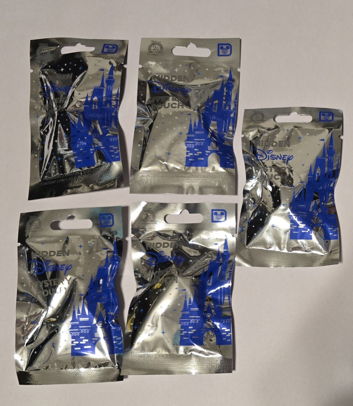 NEW 2025 WDW Wave A Hidden Mickey Mystery Pin Pouch Bags ×5 (2 Pins Per Bag) NEW 2025 WDW Wave A Hidden Mickey Mystery Pin Pouch Bags ×5 (2 Pins Per Bag)