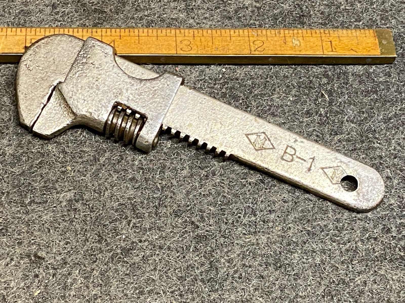 ANTQUE FRANK MOSSBERG CO. B-1 ADJUSTABLE BIKE WRENCH 5”