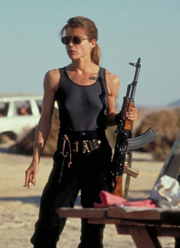 Linda Hamilton as Sarah Connor Terminator 2 in combat outfit holding rifle 8x10 Linda Hamilton as Sarah Connor Terminator 2 in combat outfit holding rifle 8x10