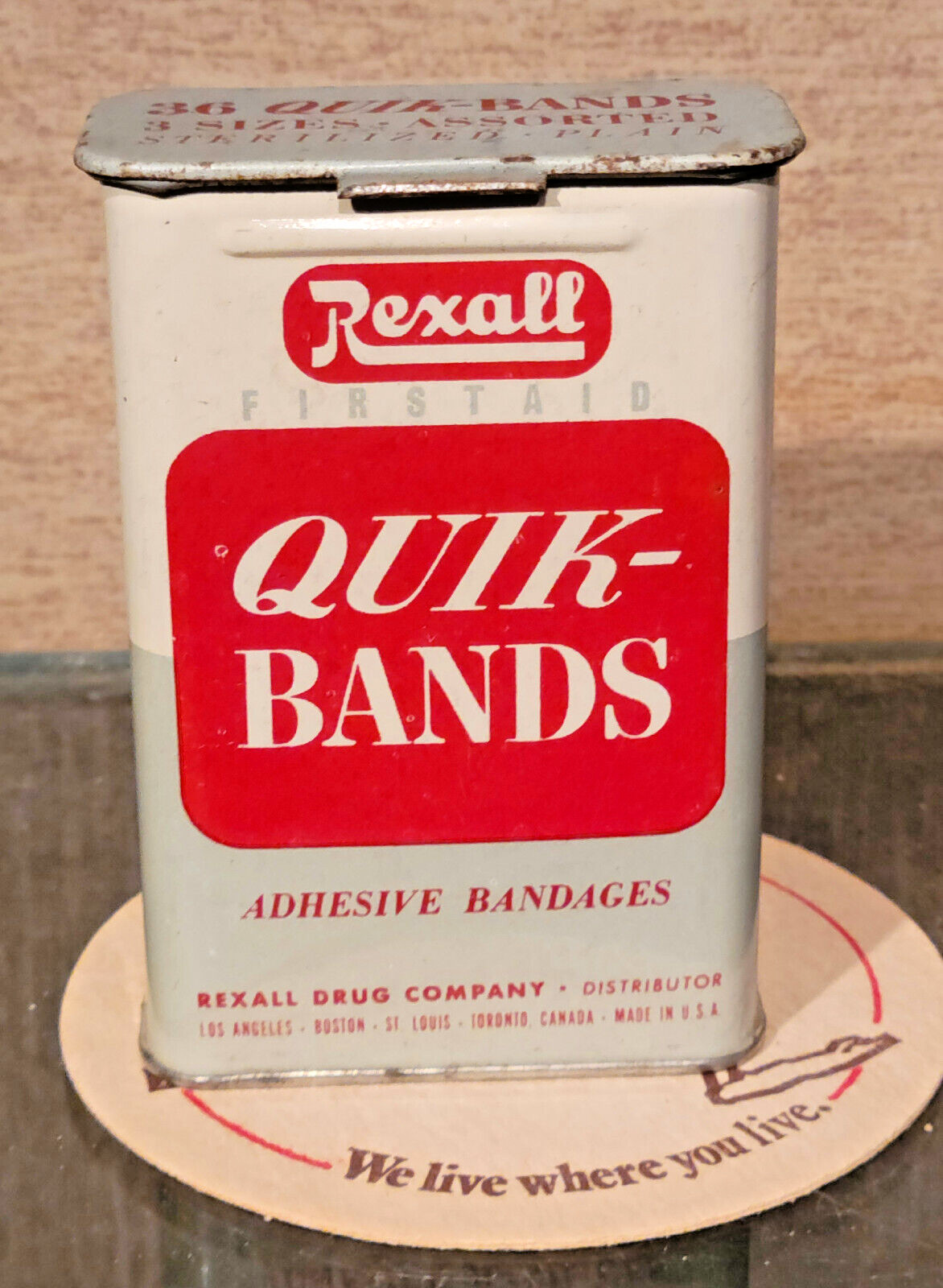 1950s REXALL FIRST AID QUIK-BANDS BANDAGES HINGED LID TIN CAN
