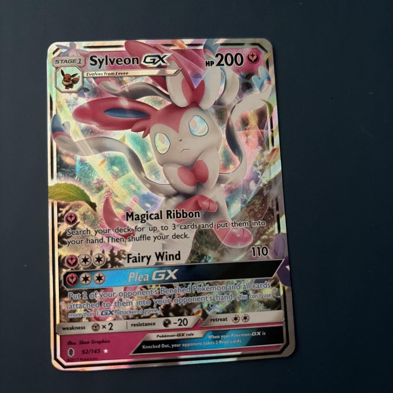 The Pokémon Company Pokémon TCG Sylveon GX 92/145 SM-Guardians Rising Holo The Pokémon Company Pokémon TCG Sylveon GX 92/145 SM-Guardians Rising Holo