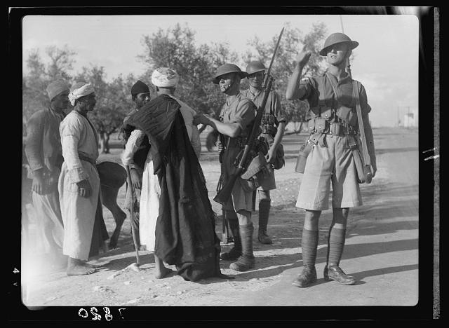Photo:Lydda Palestine 1930s British Soldiers Searching Men Curfew Day