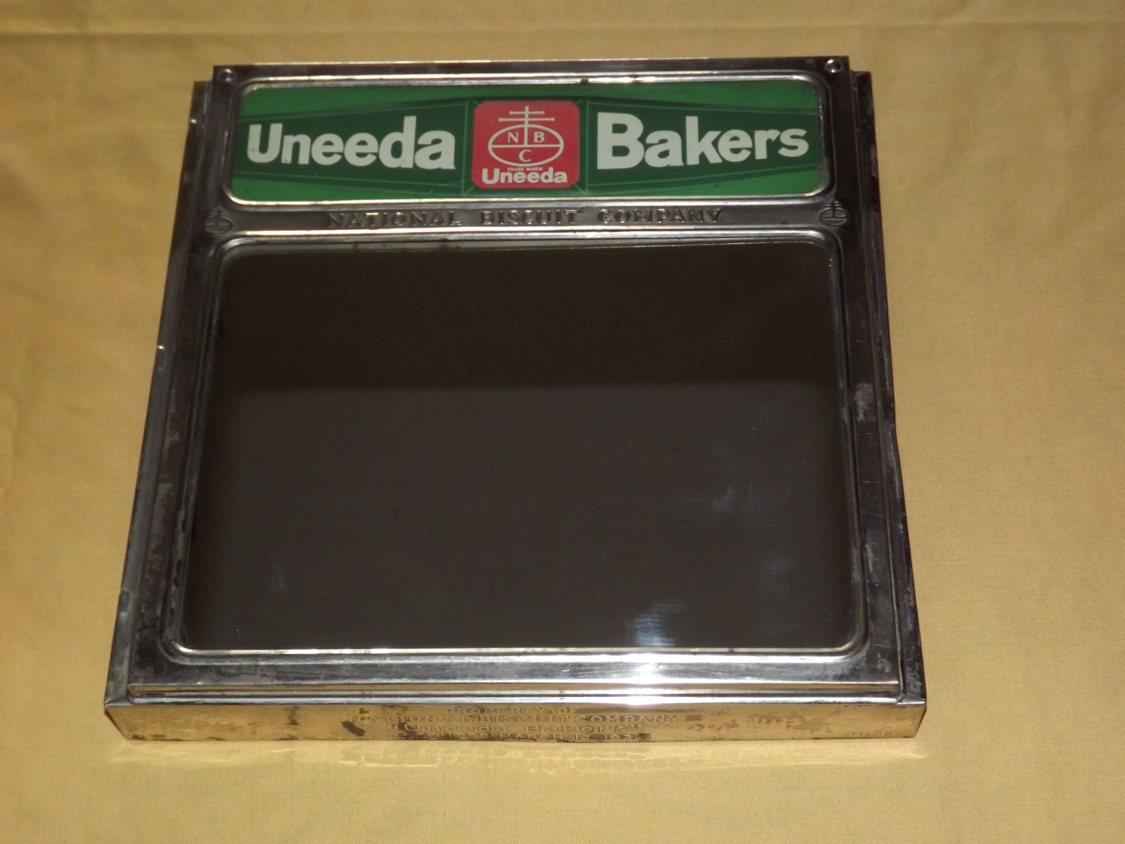 VINTAGE OLD 1920S UNEEDA BAKERS NATIONAL BISCUIT COMPANY MIRROR DISPLAY COVER